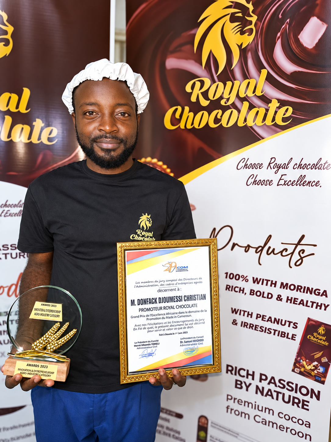 Christian Donfack Djoumessi, founder of Royal Chocolate, showcasing his Cameroonian luxury chocolate brand and its handcrafted product